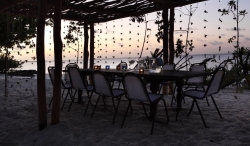 The beach gazebo lapped by the Indian Ocean is yours to relax in exclusively at Tartaruga private villa on Vamizi Island.