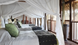 View of one of the treehouse bedrooms at Tartaruga private villa on Vamizi Island